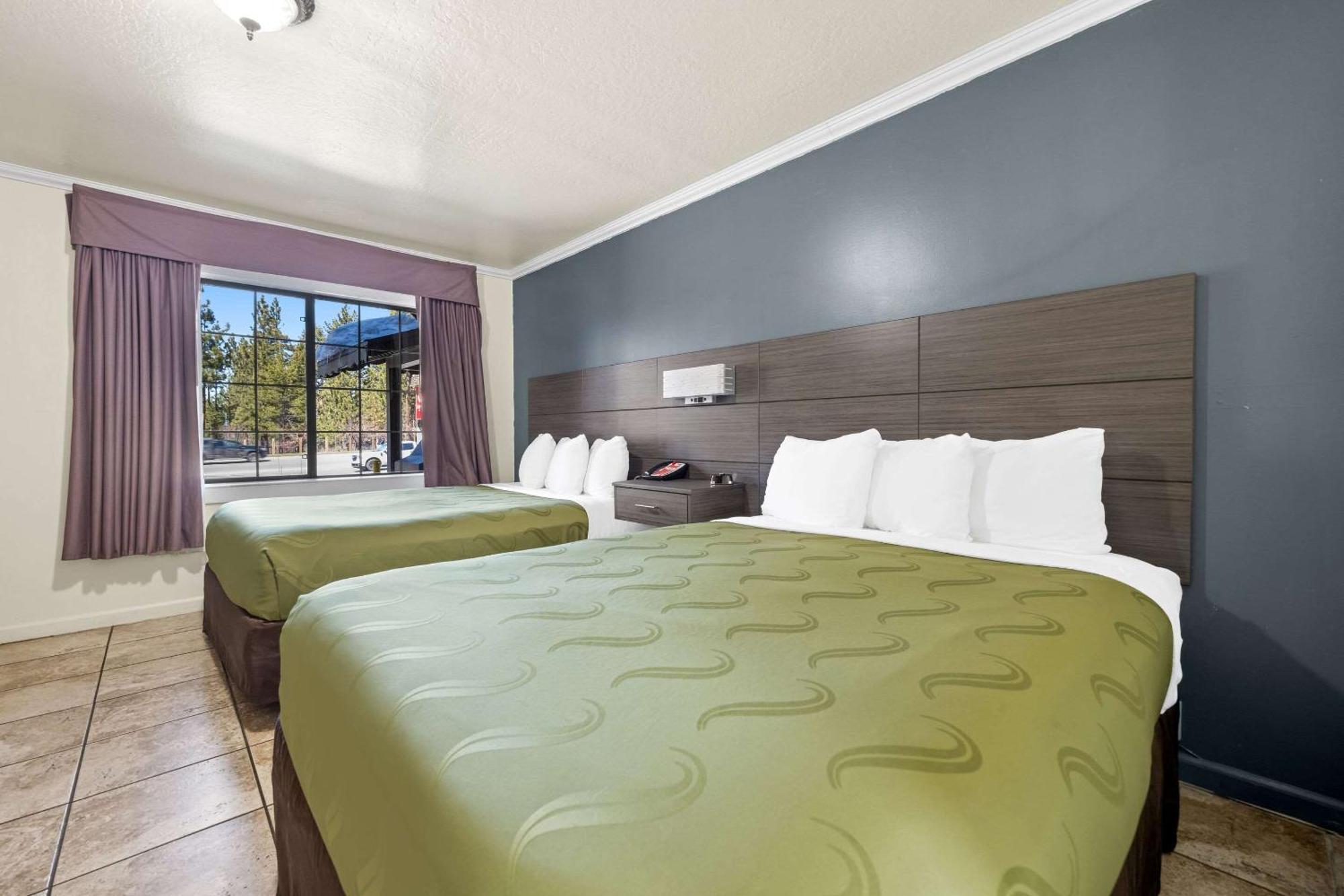 Econo & Heavenly Village Area Hotel